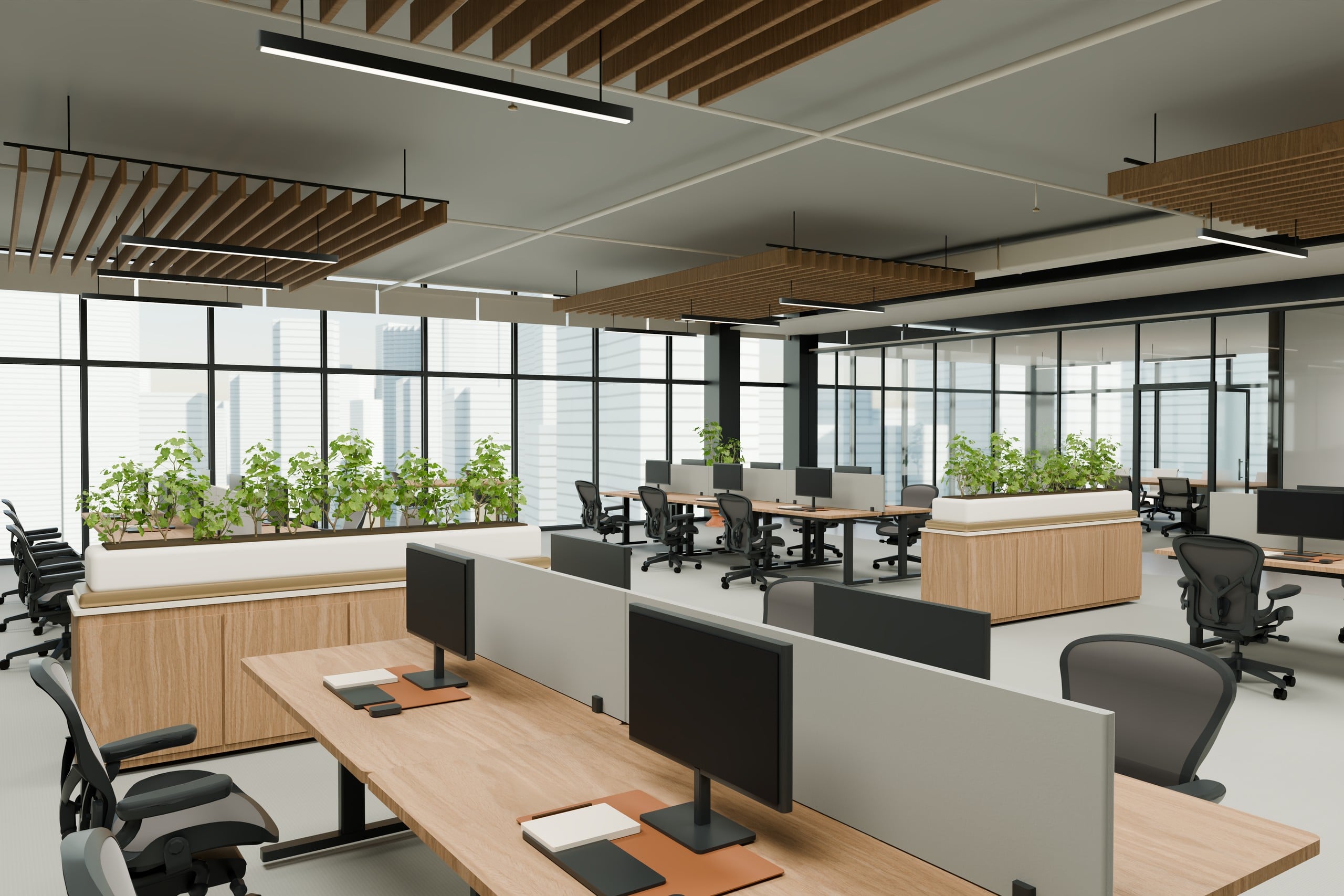Open studio with wood desks and acoustic ceiling in the PLANORA concept office.